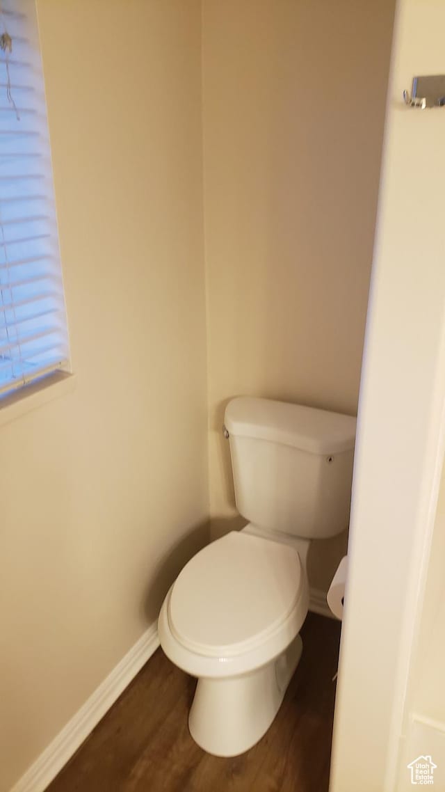 125 W 870 N, Orem, UT 84057 - bathroom featuring toilet, wood finished floors, and baseboards