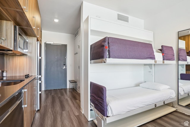 2670 Canyons Resort Dr Unit 319, Park City, UT 84098 - bedroom with dark wood finished floors and a sink