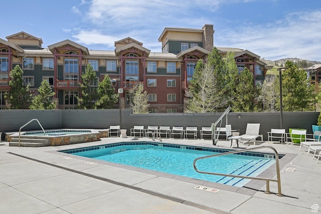 2670 Canyons Resort Dr Unit 319, Park City, UT 84098 - community pool featuring a patio area and a community hot tub
