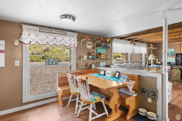 3058 S Edgemont Dr Unit 253, 54, Garden City, UT 84028 - dining space with wood finished floors and baseboards