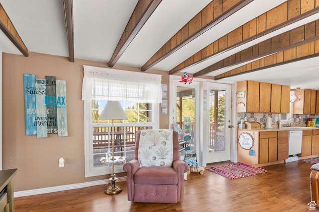 3058 S Edgemont Dr Unit 253, 54, Garden City, UT 84028 - sitting room with baseboards, wood finished floors, and beamed ceiling