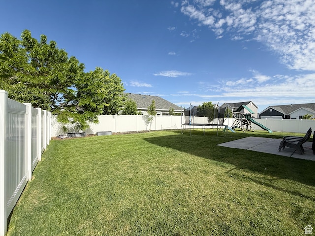 3508 S Creek Side Ln, Syracuse, UT 84075 - view of yard featuring a trampoline, a playground, and a patio area