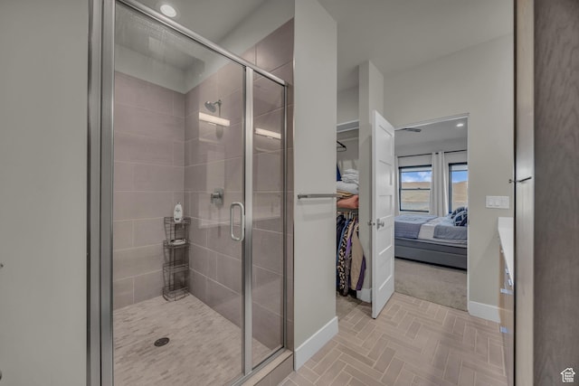 9984 N Rail Loop Unit 29, Heber City, UT 84032 - ensuite bathroom with baseboards, a shower stall, and a spacious closet