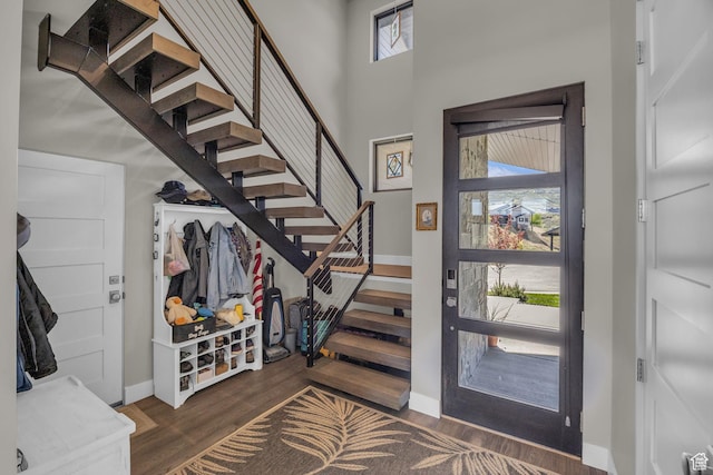 9984 N Rail Loop Unit 29, Heber City, UT 84032 - entryway featuring baseboards, wood finished floors, stairway, and a high ceiling
