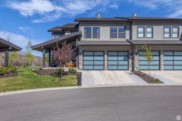 9984 N Rail Loop Unit 29, Heber City, UT 84032 - view of front of home with an attached garage, driveway, and stone siding