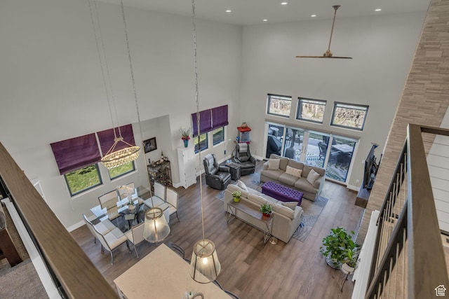 9984 N Rail Loop Unit 29, Heber City, UT 84032 - living area with a high ceiling, wood finished floors, plenty of natural light, recessed lighting, and baseboards