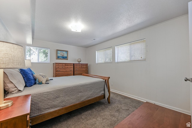 180 W Vine St, Tooele, UT 84074 - bedroom with carpet floors, a textured ceiling, and baseboards