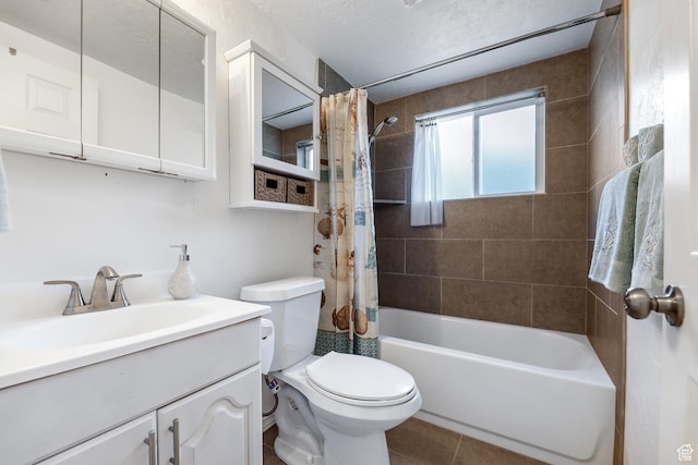 180 W Vine St, Tooele, UT 84074 - bathroom with toilet, vanity, shower / bath combo, and tile patterned flooring