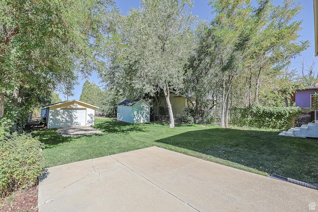 180 W Vine St, Tooele, UT 84074 - view of grassy yard with a patio