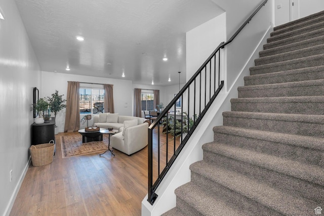 1675 S Ripple Rock Dr Unit 3010, Washington, UT 84780 - stairway featuring wood finished floors, recessed lighting, and baseboards
