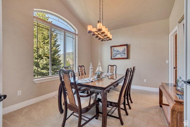 2116 E Falcon Ridge Dr, Draper Ut Cnty, UT 84020 - dining area featuring light carpet, baseboards, a chandelier, and lofted ceiling