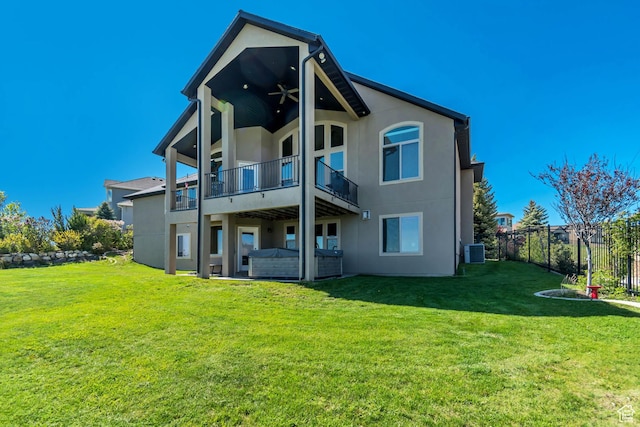 2116 E Falcon Ridge Dr, Draper Ut Cnty, UT 84020 - back of house featuring stucco siding, central air condition unit, and a balcony