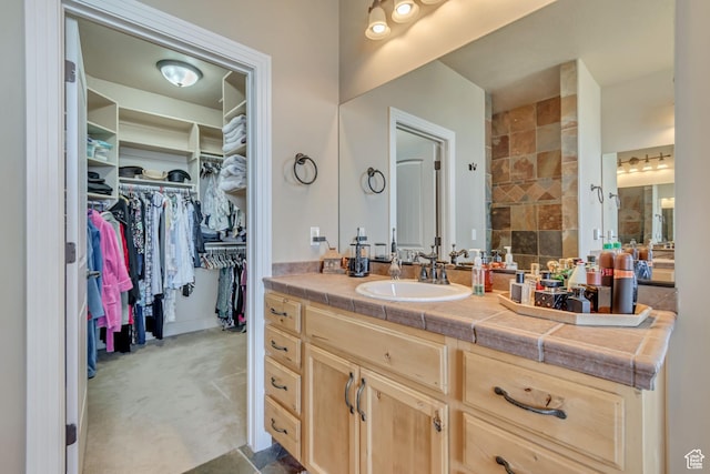 2116 E Falcon Ridge Dr, Draper Ut Cnty, UT 84020 - bathroom with vanity and a spacious closet