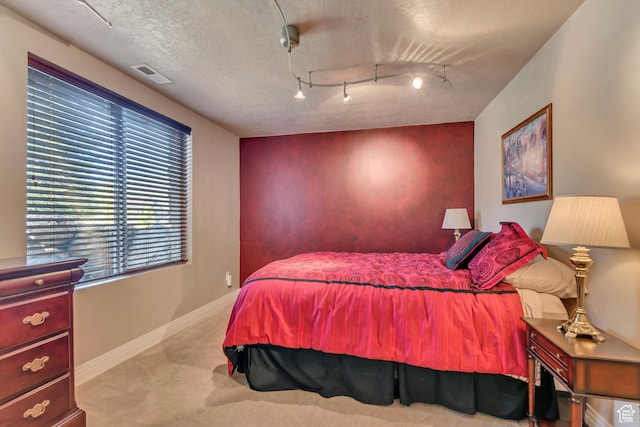 2116 E Falcon Ridge Dr, Draper Ut Cnty, UT 84020 - bedroom with carpet, baseboards, and a textured ceiling