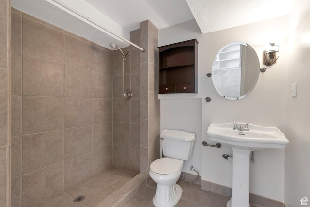 494 E High Berry Ln S, Draper, UT 84020 - bathroom with toilet, tiled shower, and tile patterned floors