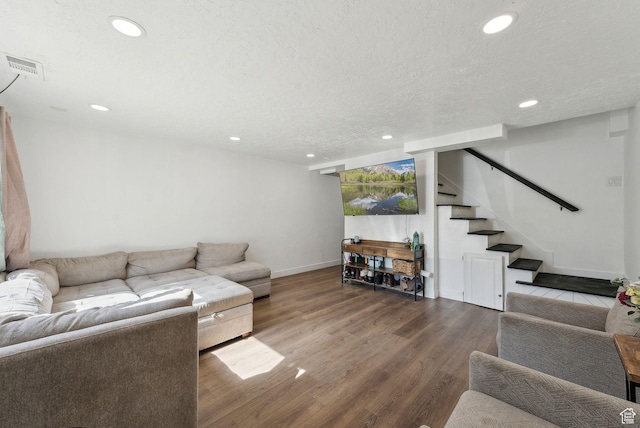 1404 N Lancelot Dr W, Provo, UT 84601 - living room featuring recessed lighting, wood finished floors, stairs, baseboards, and a textured ceiling
