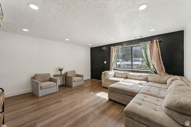 1404 N Lancelot Dr W, Provo, UT 84601 - living room featuring a textured ceiling, wood finished floors, recessed lighting, and baseboards