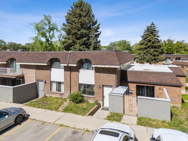 1404 N Lancelot Dr W, Provo, UT 84601 - view of building exterior featuring uncovered parking