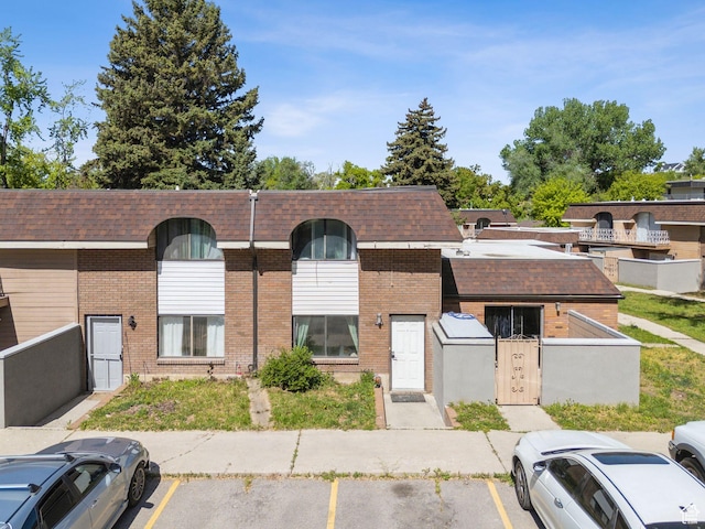 1404 N Lancelot Dr W, Provo, UT 84601 - view of building exterior featuring uncovered parking