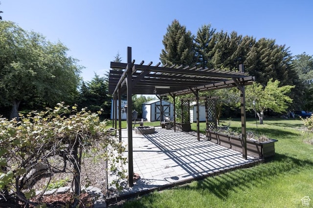30 E 200 N, Millville, UT 84326 - view of property's community featuring a patio area, a pergola, a lawn, and an outdoor fire pit
