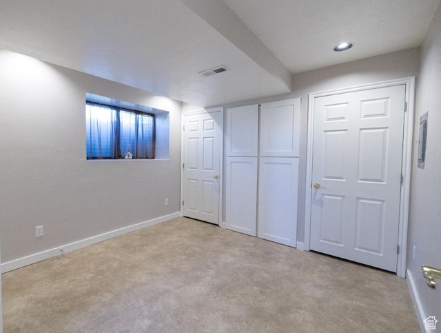 30 E 200 N, Millville, UT 84326 - unfurnished bedroom featuring light colored carpet, baseboards, and a closet