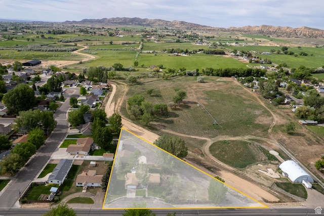 1273 W 1500 S, Vernal, UT 84078 - aerial overview of property's location with property parcel outlined and a mountain backdrop