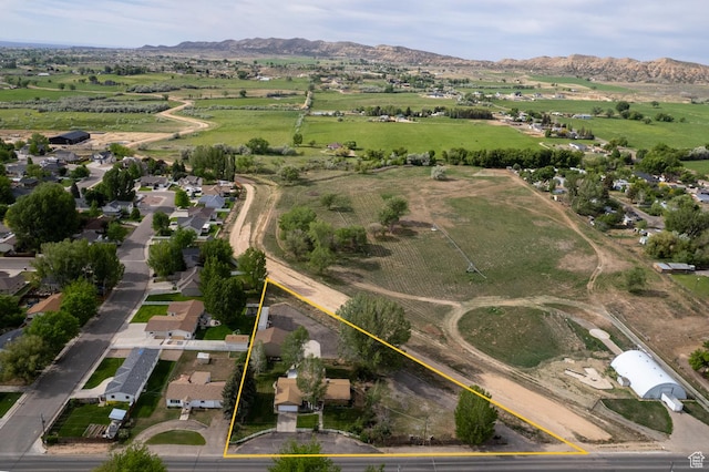 1273 W 1500 S, Vernal, UT 84078 - aerial view of sparsely populated area featuring property boundaries highlighted and a mountainous background