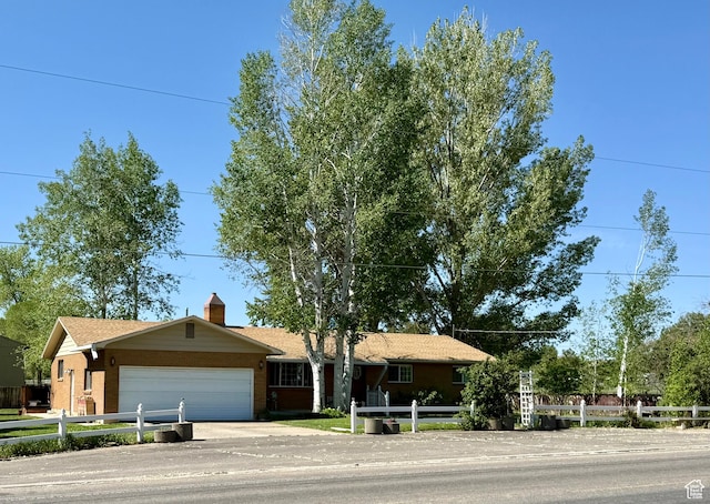 1273 W 1500 S, Vernal, UT 84078 - ranch-style house featuring a garage and driveway