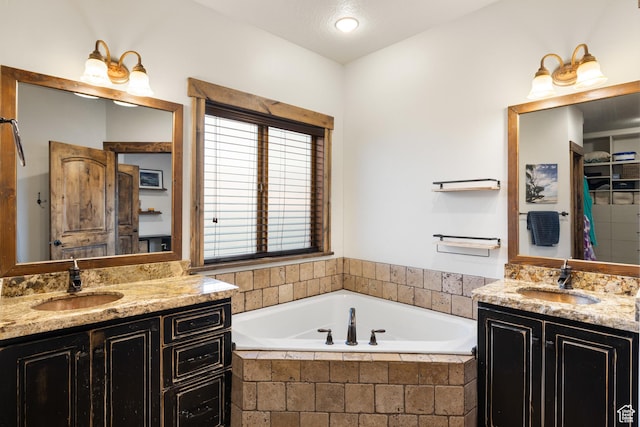 300 E 400 S, Kamas, UT 84036 - bathroom featuring two vanities, a bath, and a shower