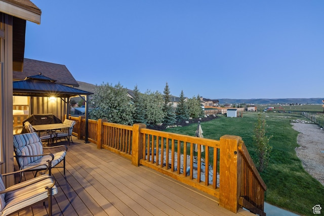 300 E 400 S, Kamas, UT 84036 - wooden terrace featuring a gazebo, outdoor dining space, and a yard