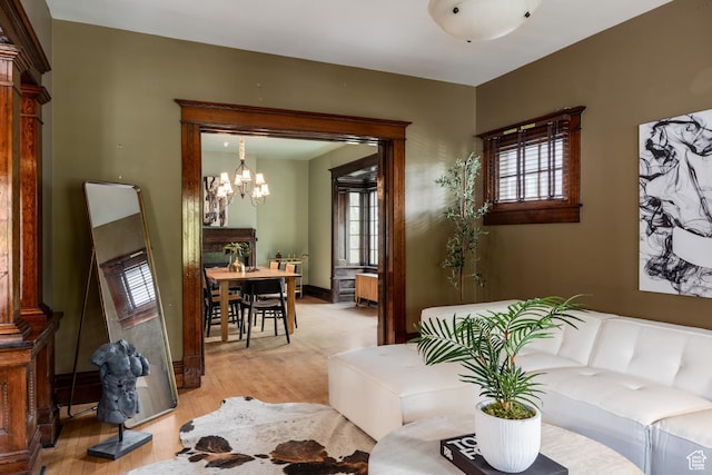 216 B St, Salt Lake City, UT 84103 - living area with light wood finished floors and a chandelier