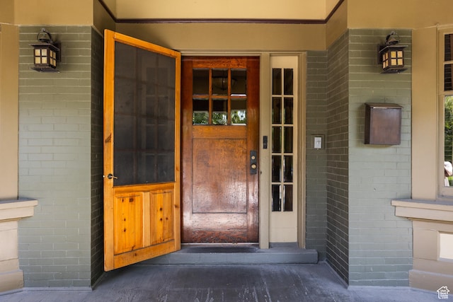 216 B St, Salt Lake City, UT 84103 - doorway to property featuring brick siding