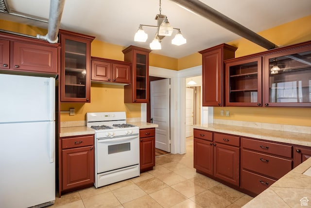 216 B St, Salt Lake City, UT 84103 - kitchen with white appliances, light countertops, and glass insert cabinets