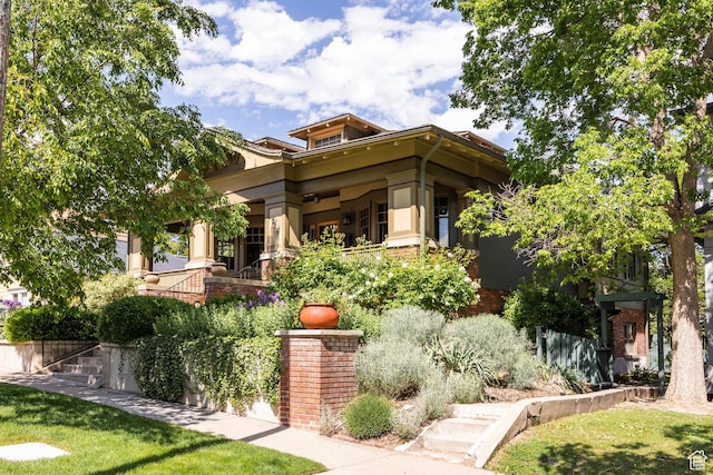 216 B St, Salt Lake City, UT 84103 - view of front facade featuring a front lawn and stucco siding