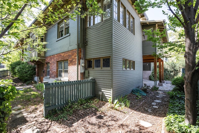 216 B St, Salt Lake City, UT 84103 - view of side of home featuring brick siding