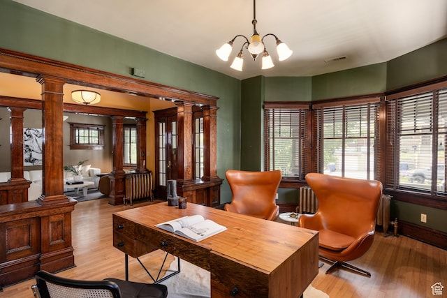 216 B St, Salt Lake City, UT 84103 - office space featuring a chandelier, decorative columns, and wood finished floors