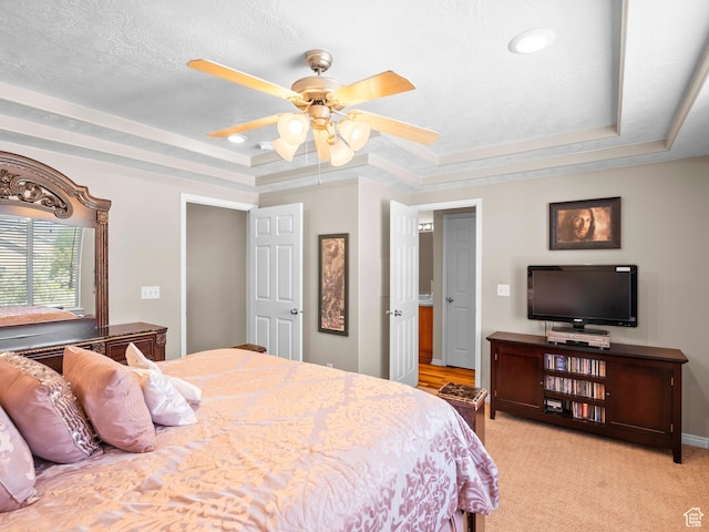 8552 S Maul Oak Dr, West Jordan, UT 84081 - bedroom with a tray ceiling, ceiling fan, and light colored carpet
