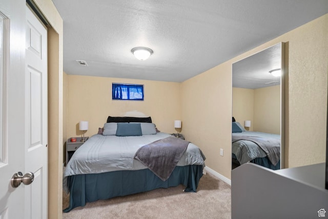 293 E 600 N, Tooele, UT 84074 - carpeted bedroom with a textured ceiling and baseboards
