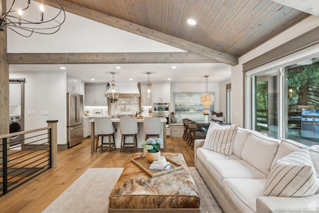 3058 Elk Run Dr W, Park City, UT 84098 - living area with recessed lighting, washer / clothes dryer, light wood-style flooring, a chandelier, and wooden ceiling