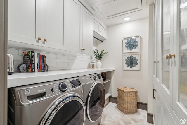 3058 Elk Run Dr W, Park City, UT 84098 - laundry area with cabinet space, separate washer and dryer, attic access, and brick patterned flooring