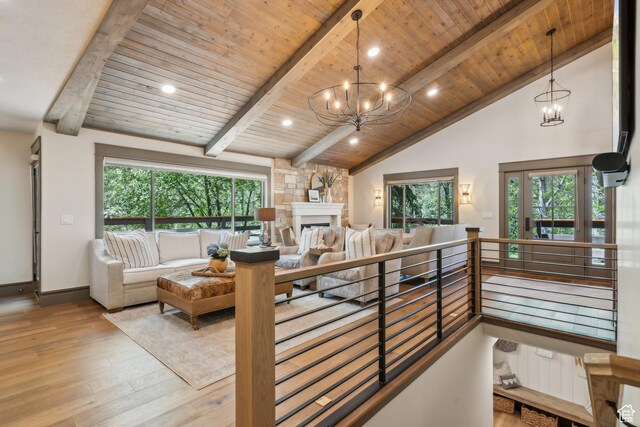 3058 Elk Run Dr W, Park City, UT 84098 - living room featuring a chandelier, wood finished floors, healthy amount of natural light, a wooden ceiling with exposed beams, and recessed lighting