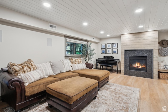 3058 Elk Run Dr W, Park City, UT 84098 - living room with wood finished floors, recessed lighting, wooden ceiling, and a tiled fireplace