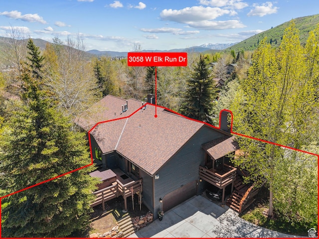 3058 Elk Run Dr W, Park City, UT 84098 - view from above of property with property parcel outlined and a mountainous background