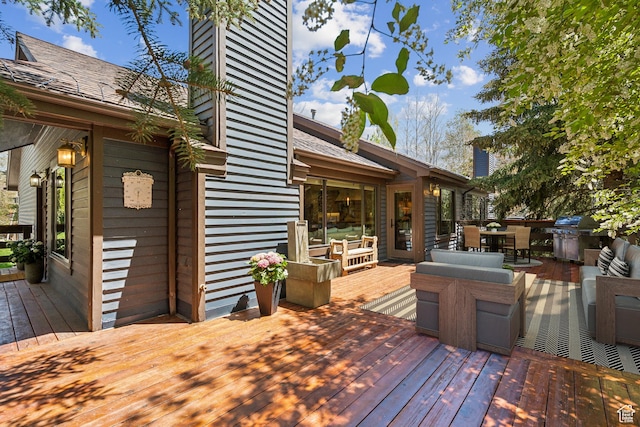 3058 Elk Run Dr W, Park City, UT 84098 - wooden deck with outdoor dining area, an outdoor hangout area, and area for grilling