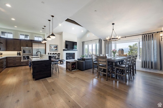 201 N Kings Peak Ct Unit Cp-23, Heber City, UT 84032 - dining room with light wood-style floors, healthy amount of natural light, a chandelier, and recessed lighting