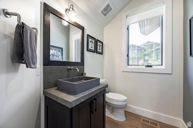 201 N Kings Peak Ct Unit Cp-23, Heber City, UT 84032 - half bath with toilet, vanity, wood finished floors, and baseboards