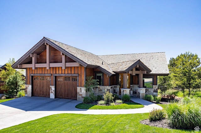 201 N Kings Peak Ct Unit Cp-23, Heber City, UT 84032 - view of front of property featuring driveway, stone siding, a front yard, and a garage