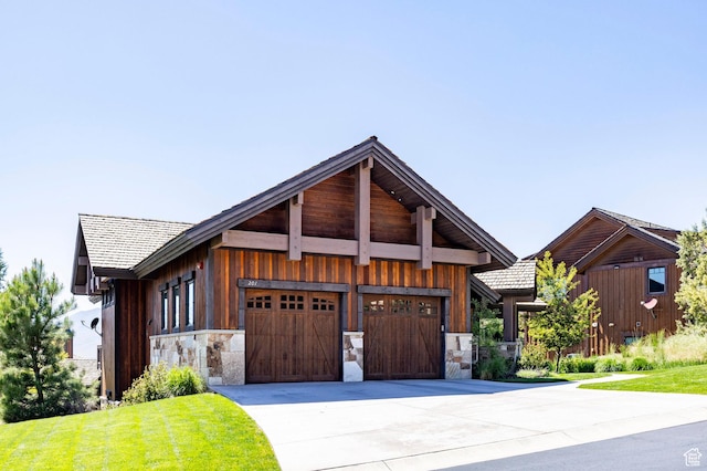201 N Kings Peak Ct Unit Cp-23, Heber City, UT 84032 - view of front facade featuring stone siding, driveway, a front lawn, and a garage