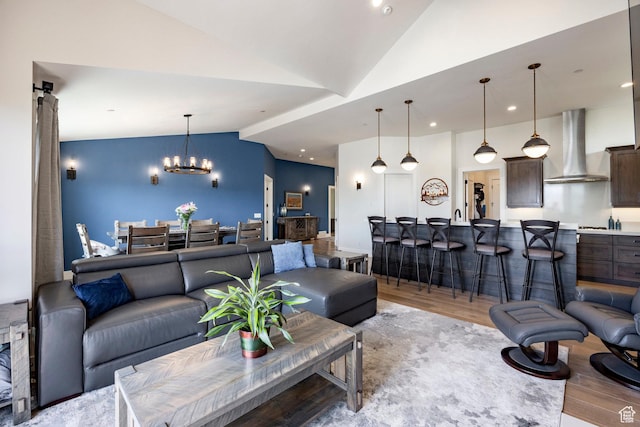 201 N Kings Peak Ct Unit Cp-23, Heber City, UT 84032 - living area with lofted ceiling, light wood-type flooring, and a chandelier