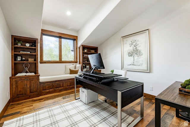 2938 Daybreaker Dr, Park City, UT 84098 - home office with light wood-style flooring, baseboards, and vaulted ceiling